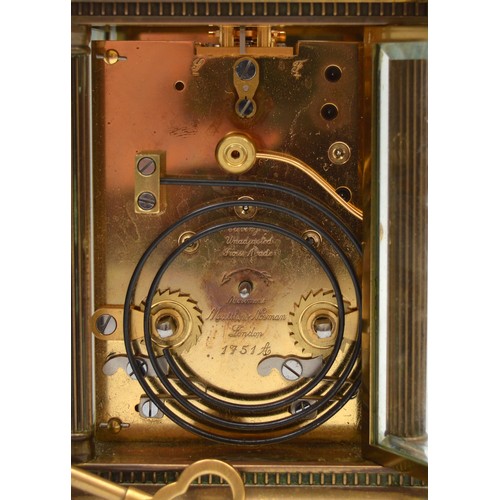 398 - Mathew Norman, London, a 20th century  brass repeating and striking carriage clock, signed enameled ... 