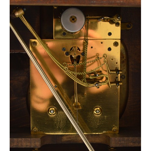 402 - Junghans, a 20th century oak Westminster chiming bracket clock, retailed by T.P. Wright, Holloway Ro... 