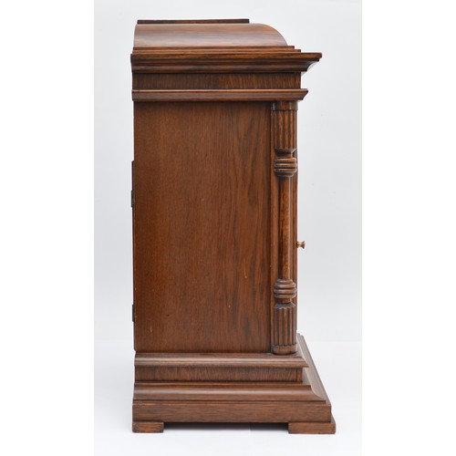 402 - Junghans, a 20th century oak Westminster chiming bracket clock, retailed by T.P. Wright, Holloway Ro... 