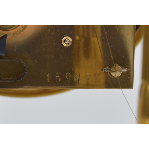 403 - Haller & Benzing, a German 20th century brass Bandstand anniversary mantel clock, off white dial wit... 