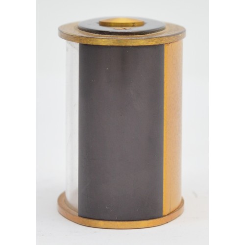 416 - Jaeger, a brass and black oval alarm clock, c.1950's, 6 x 3.5 x 4.5cm.
In working order, but not gua... 