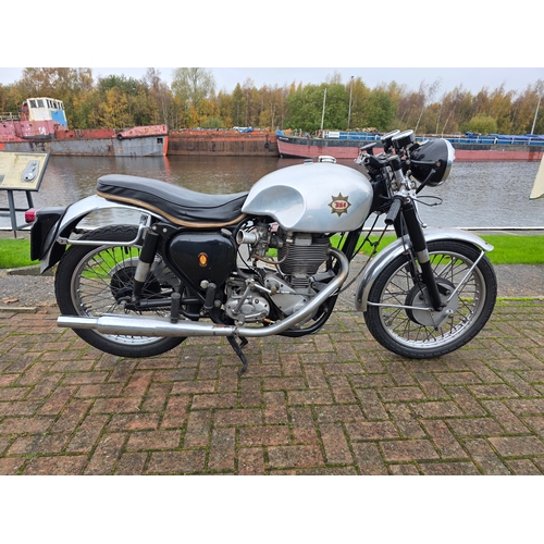 1962 BSA Gold Star DBD34, 500cc, Clubman trim. Registration number SCK 646. Frame number CB32 11129. Engine number DBD34 GS 6525.
Sold with the V5C, V5, VE60, 1977 purchase receipt and a 1986 MOT.
To start the Goldie story, we go back to 1937, when Wal Handley came out of retirement to ride a three-lap race for BSA at Brooklands. Winning the race, with the fastest lap of 107.5mph, Wal earned himself the Gold Star (awarded for race laps in excess of 100mph) and with it launched the Gold Star marque. The following year saw the first of the production Gold Stars, the M24, complete with the trademark alloy barrel and cylinder head. The engines were built from individually selected parts and bench tested, a practice that was to remain throughout its life.  The 350cc model was followed by the 500cc ZB34.
1953 saw the introduction of the BB series (BB32-350cc/BB34-500cc) with new duplex cradle frame and swinging arm rear suspension. These were followed in 1954 by the CB series with engine changes aimed primarily at the road racers. Immediate success was achieved in the Clubman's TT and this cycle of engine redesign and immediate success was repeated the following year with the DB series. Towards the end the Gold Star was only offered in scrambles or Clubman's trim. In 1963 Lucas ceased to produce the magneto used in the B series, which was a prime reason that BSA and Triumph reconfigured their pre-unit-construction parallel twins into engines with integral gearboxes, simultaneously converting the ignition system from magneto to battery and coil. The Gold Star was not considered for progression to unit-construction, and instead the 250cc BSA C15 was developed (via the B40) into the 500cc B50.
SCK was owned by David Lawson of Ashby de la Zouch in 1970, before Wilemans Motors of Derby sold it to Brian Johnson of Loughborough in 1973, next was Raymond Poole of Hornsea in 1976, he sold it to our vendors father in 1977 for £850. Used for many years by him, until his passing in 2016. It has been dry stored ever since and this original Goldie will now need recommissioning.