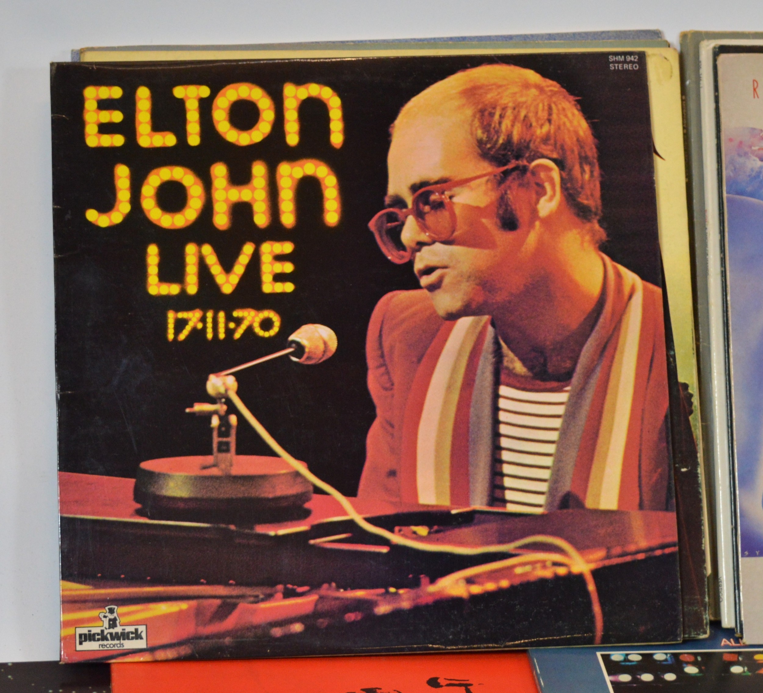 A collection of over thirty Vinyl LP's, mostly rock and prog rock, to ...