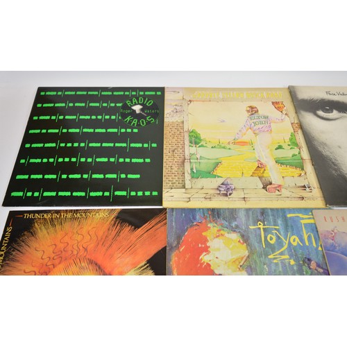 A collection of over thirty Vinyl LP's, mostly rock and prog rock, to ...