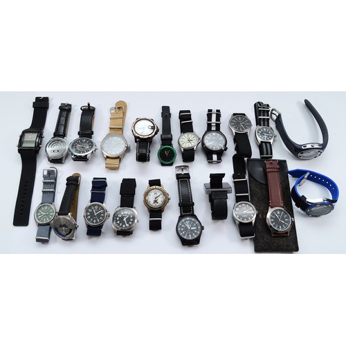 A collection of twenty quartz gentleman's fashion wristwatches. (1 box)