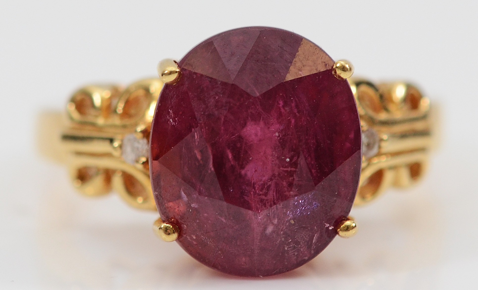 An 18ct gold Royal ruby and brilliant cut diamond dress ring, 6.062ct ...