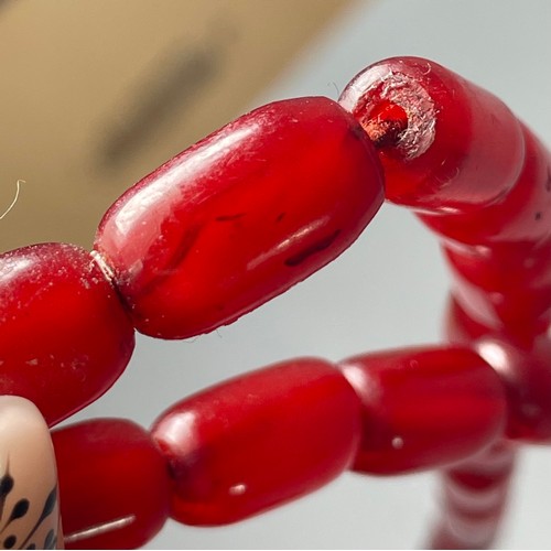16 - A cherry Bakelite beaded necklace, graduated beads, largest 25mm, screw closure, 92cm, 90g