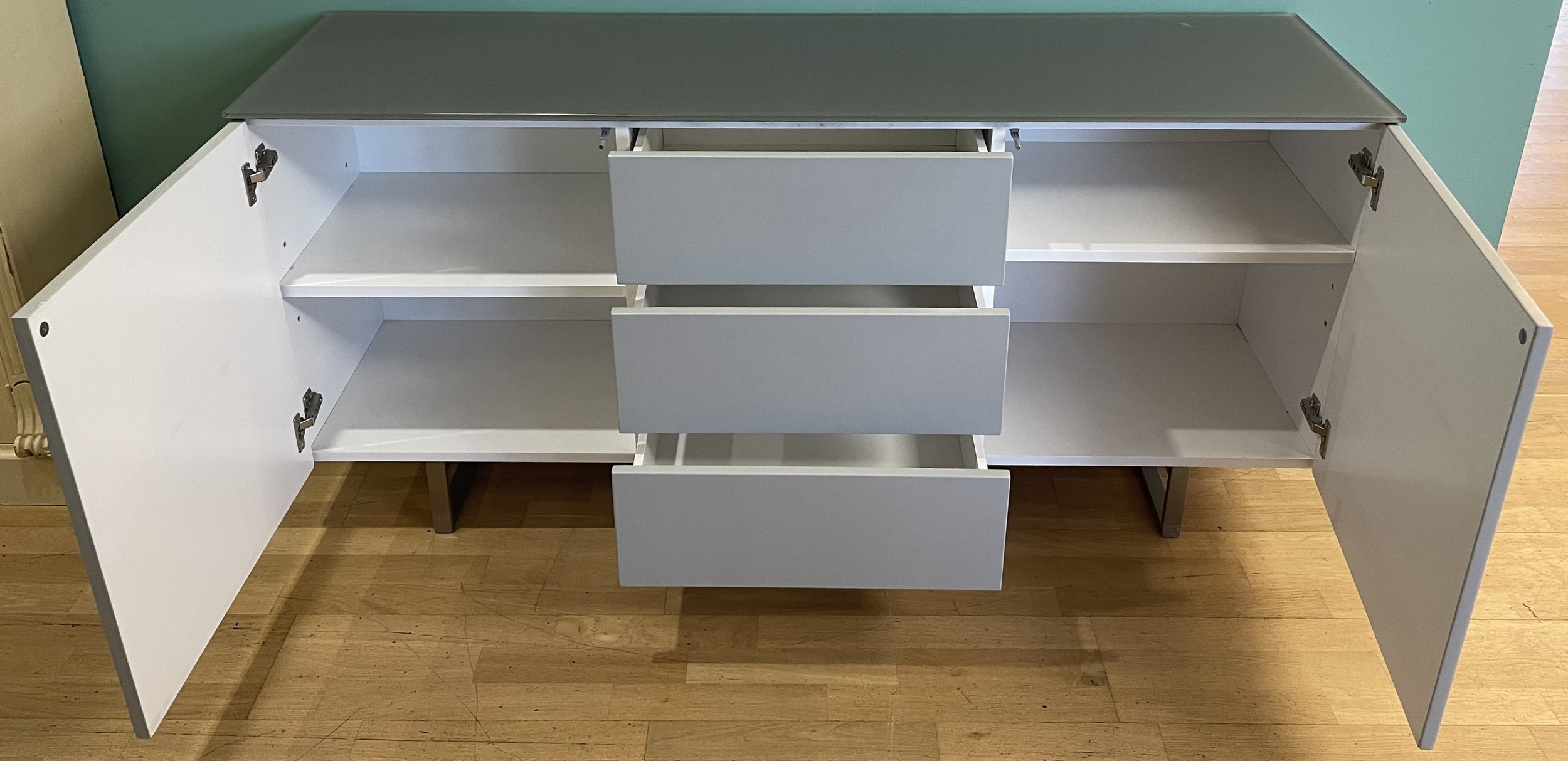 A modern Danetti sideboard, finished in eve matt grey and frosted glass ...
