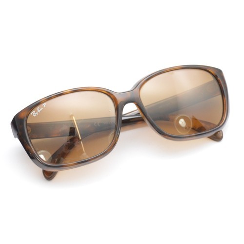 Four pairs of designer Ray-Ban sunglasses, to include, Wayfarers and a ...