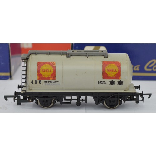 7 - Six '00' gauge railway wagons - 3 Hornby Shell tank wagons and 3 Lima wagons (2 St. Ivel milk tanker... 