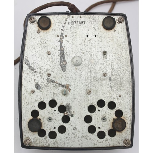 21 - A wooden cased signal box shelf telephone and a black Bakelite internal office telephone- both with ... 