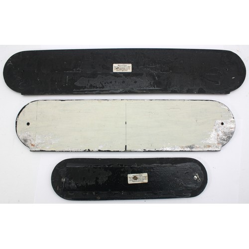 25 - Three replica metal items- Two Seatbacks (Holt/Marske) and a door plate 