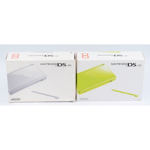 Nintendo DS Lite handheld gaming consoles, one in green boxed with ...