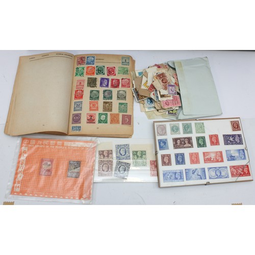 A stamp collection held across multiple albums, containing stamps from ...