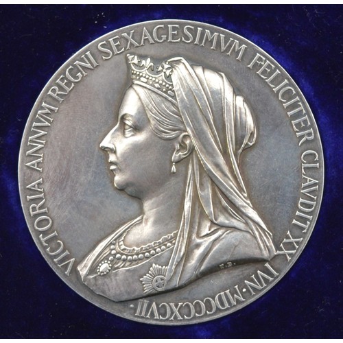 A Queen Victoria 1897 Diamond Jubilee silver medallion, sculptured
