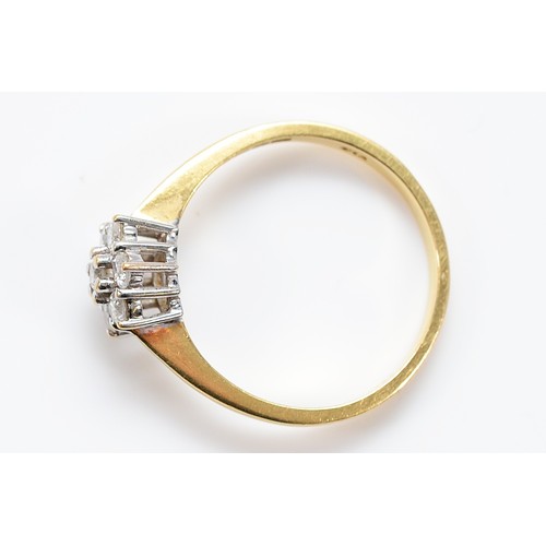 4 - An 18ct gold brilliant cut diamond floral cluster ring, stated 0.50ct, S, 3.8g