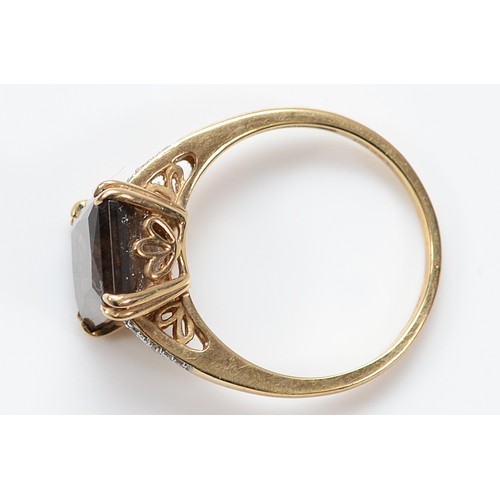 A QVC 9ct gold smokey quartz dress ring with diamond set shoulders ...
