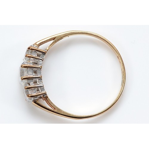 124 - A 9ct gold cubic zirconia three stone ring, P 1/2, 2g