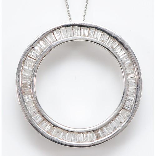 130 - A 9ct white gold diamond pendant on a chain, 20mm, 2.4g