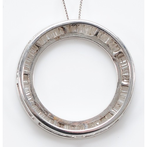 130 - A 9ct white gold diamond pendant on a chain, 20mm, 2.4g