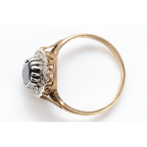 146 - A 9ct gold sapphire and diamond cluster ring, N, 3.1g