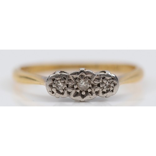 155 - An 18ct gold and platinum three stone diamond ring, K, 1.6g