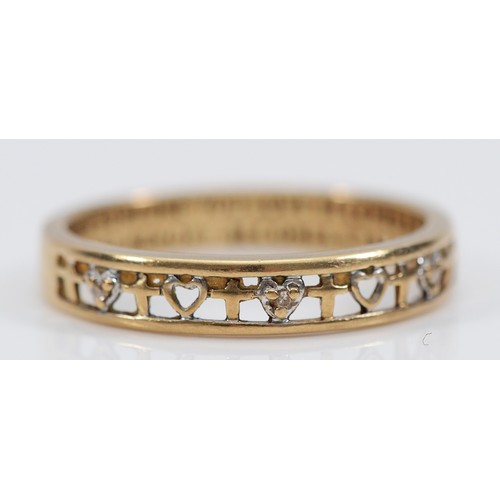 A 9ct gold open work memory ring, R, 2.2g