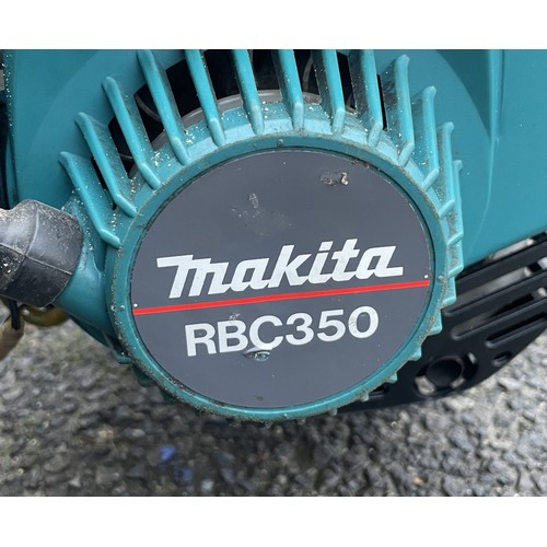 6 - A Makita RBC 350 petrol driven garden strimmer.