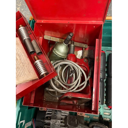 18 - Two boxes of power tools, to include, a Bosch 3.6V screwdriver, Wolf ripsaw, two 110V transformers, ... 