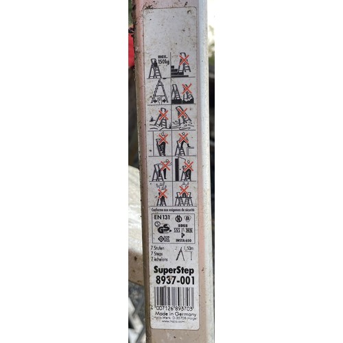 26 - A galvanised domestic double extension ladder (5.02m extended) together with two folding step ladder... 