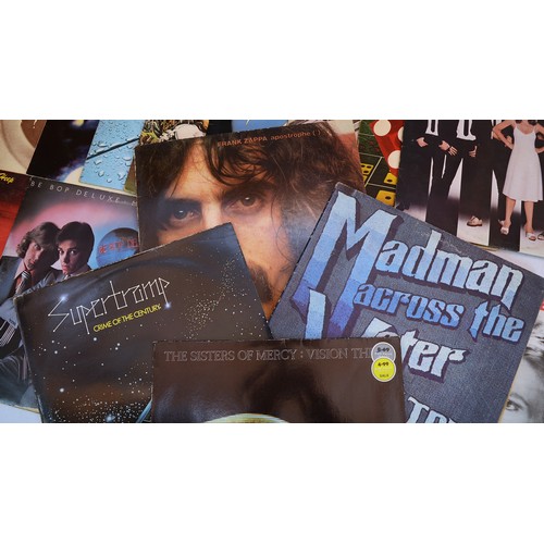 47 - A collection of sixteen vinyl LP's to include artists, Free, Blondie, SuperTramp, Elton John and oth... 