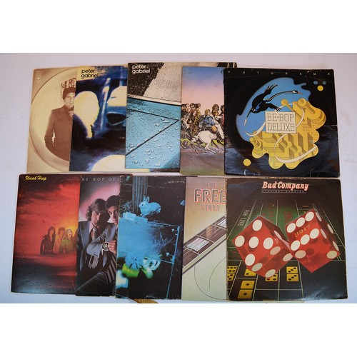 47 - A collection of sixteen vinyl LP's to include artists, Free, Blondie, SuperTramp, Elton John and oth... 