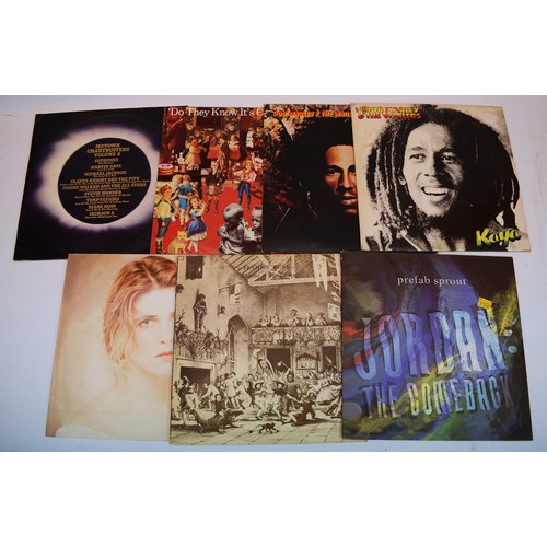 48 - A collection of fifteen vinyl LP's to include artists, Lynyrd Skynyrd, Chris Rea, Jethro Tull, Free ... 