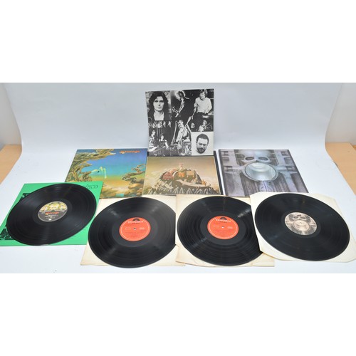 49 - A collection of twelve vinyl LP's to include artists, Free, U2, Frank Zappa and others, please see i... 