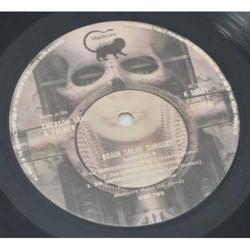 49 - A collection of twelve vinyl LP's to include artists, Free, U2, Frank Zappa and others, please see i... 