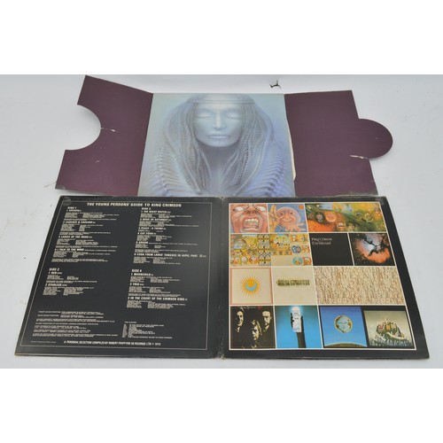 49 - A collection of twelve vinyl LP's to include artists, Free, U2, Frank Zappa and others, please see i... 