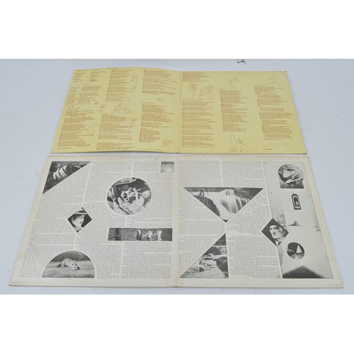 52 - A collection of twelve vinyl LP's to include artists, Queen, Guns n' roses, Elton John and Genesis, ... 