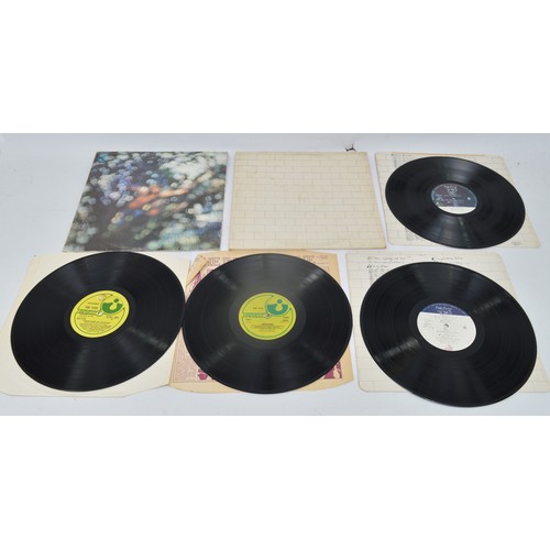 53 - A collection of ten rock vinyl LP's to include Pink Floyd, Meat Loaf, Rolling Stones, AC/DC and Carp... 