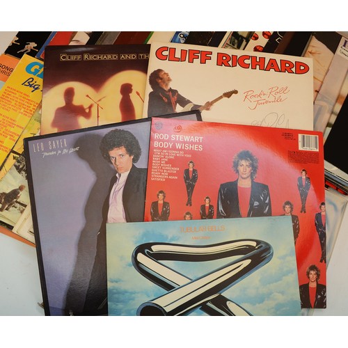 59 - A collection of 67 vinyl LP's and compilation albums to include artists, Elton John, Rod Stewart, Ro... 