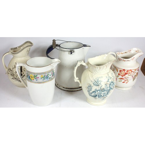 Five large pitchers, to include, rustic white enamel pitcher, possibly ...