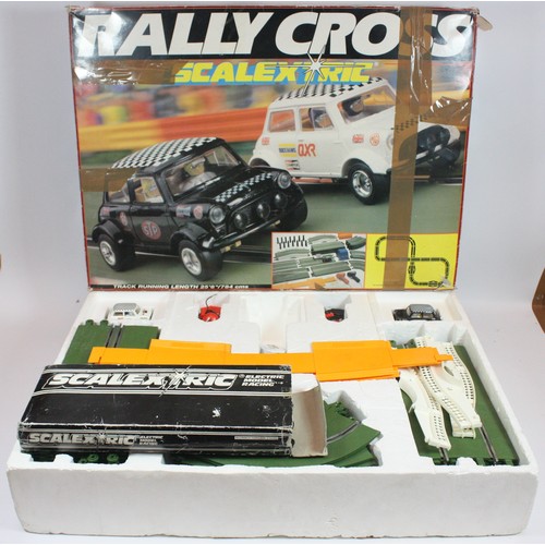 A boxed Scalextric model car racing set 'Rally Cross' with additional ...
