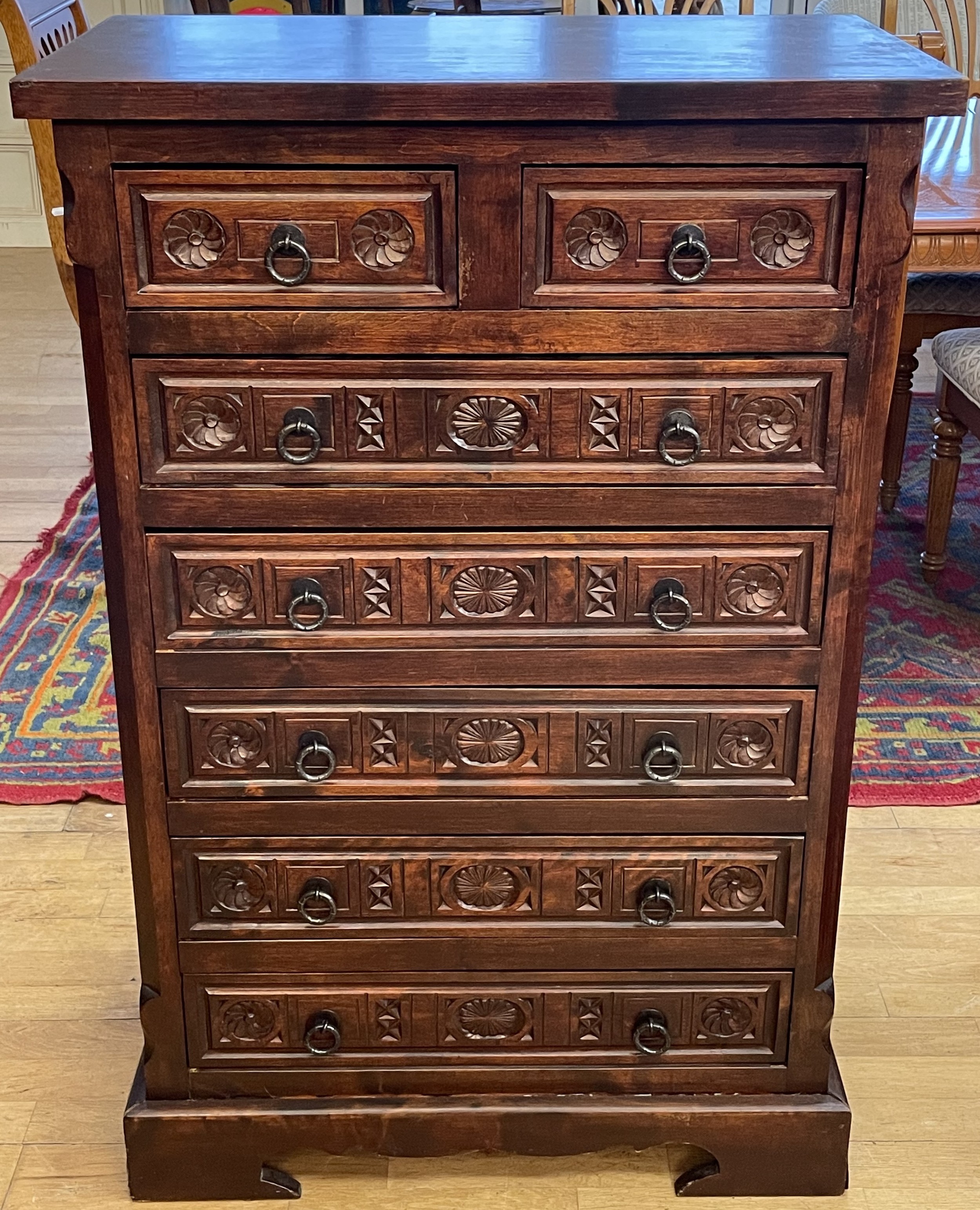 A 20th century carved oak Wellington chest of drawers, in the French ...