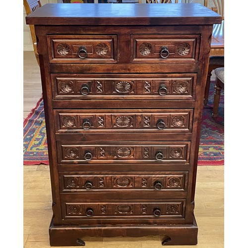 A 20th century carved oak Wellington chest of drawers, in the French ...