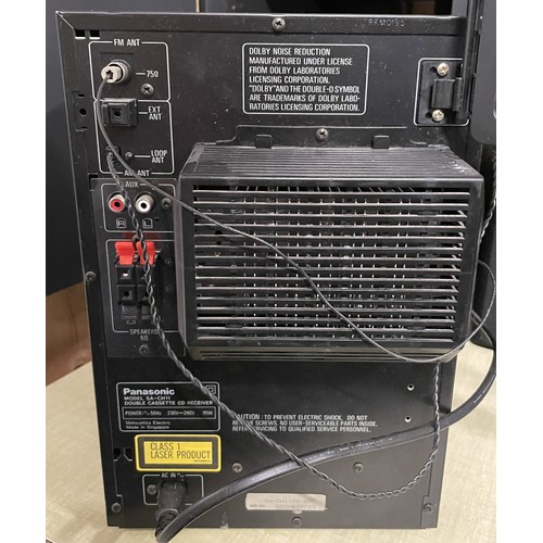31 - A Panasonic integrated midi stereo Hi-Fi system, model SC-CH11, comprising tuner, amplifier, double ... 