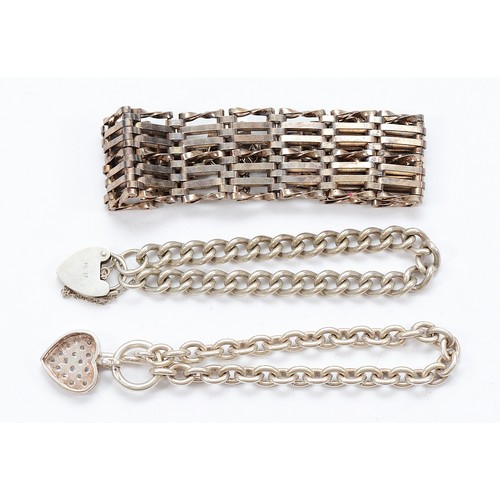 65 - A 925 silver gemset curb link bracelet with heart tag, with two silver bracelets with heart padlock ... 