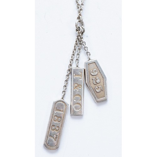 74 - Tiffany & Co, a silver three tag necklace, London 2006, 7g