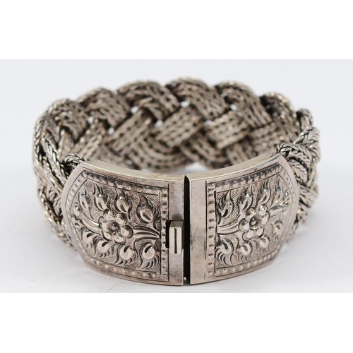 96 - A 925 silver plaited bracelet with floral clasp, 18.5cm, 76g