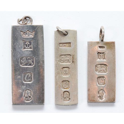 97 - Two silver ingot pendants, Birmingham 1977, with a silver ingot pendant, London 1977, 62g