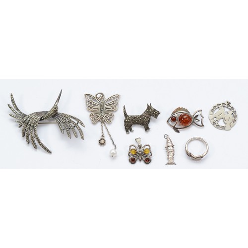 98 - Three silver pendants, three unmarked silver brooches, an unmarked silver pendant and an unmarked si... 