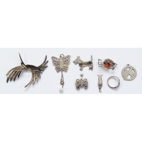 98 - Three silver pendants, three unmarked silver brooches, an unmarked silver pendant and an unmarked si... 